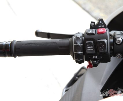 Left-side switches with scroll wheel.