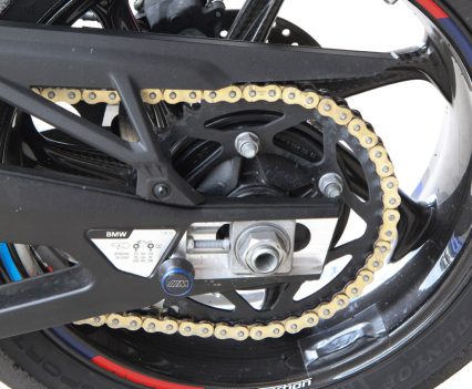 Longer swingarm, one tooth lower gearing.