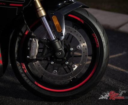 Brembo M40 four-piston radially mounted caliper, single 320mm floating disc.