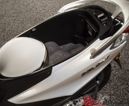 Lots of under seat storage, fits a full face lid and jacket and gloves.