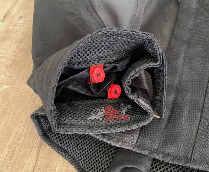 Red loops for securing the liners to the sleeves.