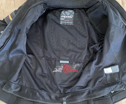 Breathable for the warm days but easy to zip a liner in. There is a pocket for a foam back protector too.