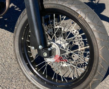 The KLX230SM has 17in wheels and bigger front brakes.