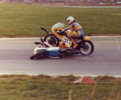 Wayne Dinham crashing his Yamaha TZ350. He was unhurt, even after Soper ran him over!