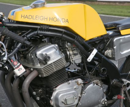 Air-cooled SOHC transverse in-line four-cylinder four-stroke with central chain camdrive.