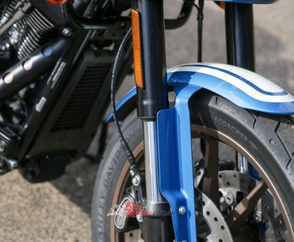 43mm inverted with aluminium fork triple clamps; triple rate spring.