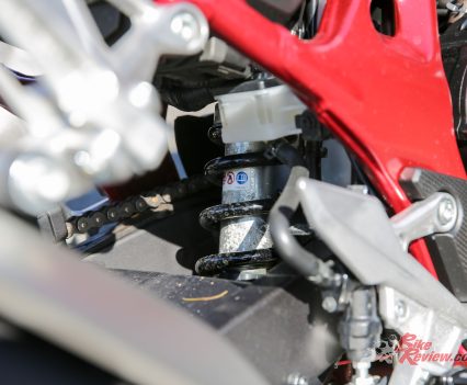 SHOWA ProLink shock with five-stage preload adjustment.