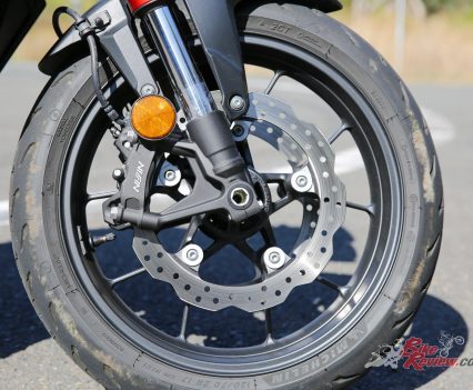 Twin 296mm discs, ABS.