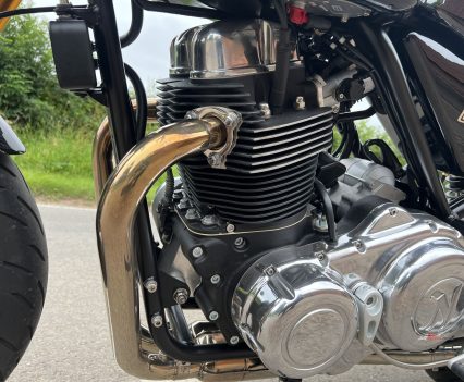 Norton air-oil-cooled pushrod parallel twin with dry sump lubrication.