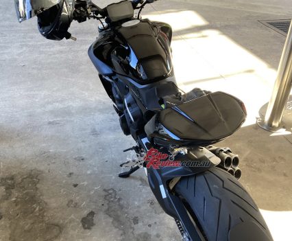 Redesigned ergonomics including hidden pillion pegs and a pillion seat cover.