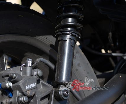 Pre-load adjustable twin shocks, 145mm travel.