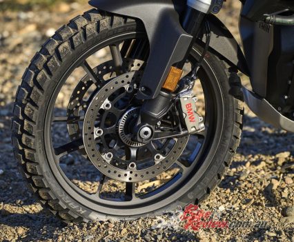 Twin semi-floating 310mm brake rotors, four-piston radial brake calipers.