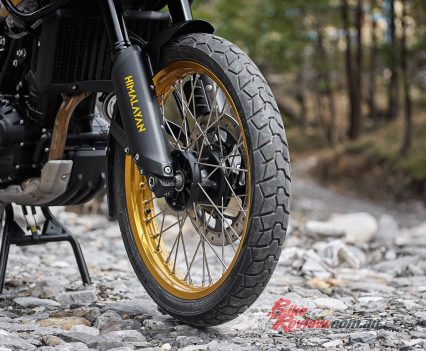 21in wheel, SHOWA SFF forks.