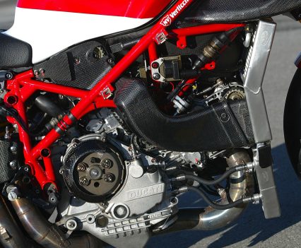 Water-cooled DOHC 90-degree V-twin four-stroke with four valves per cylinder and toothed belt desmodromic camshaft drive.