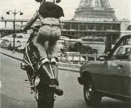Martin popping a wheelie near the Eiffel tower.