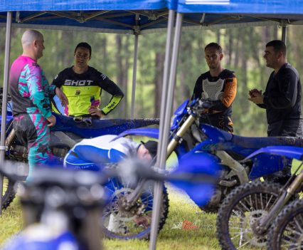 Dan and some of the other media having a laugh about the pissing rain!